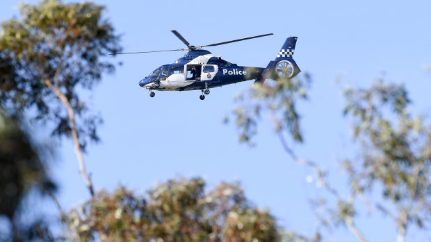 The Victoria Police air wing was brought in to winch the group of four to safety.
