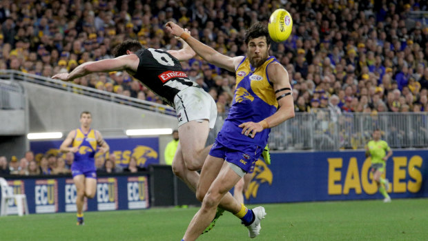 Brushed aside: Josh Kennedy shook off Tyson Goldsack in the final term to get West Coast over the line in the qualifying final at Optus Stadium.