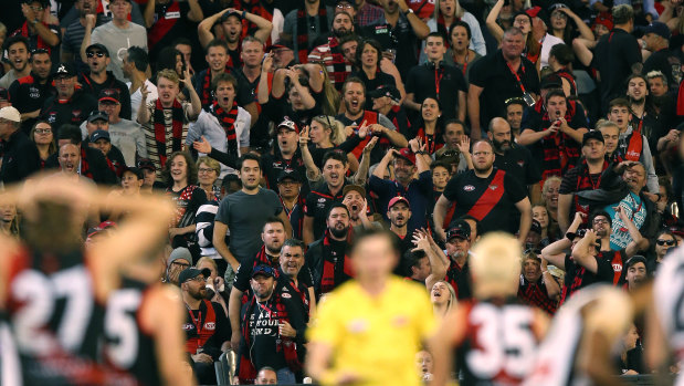 Essendon fans voice their displeasure during the Anzac Day match against Collingwood.