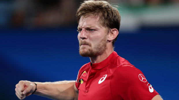 David Goffin beat Grigor Dimitrov in three sets to keep Belgium alive and set up a quarter-final clash between Australia and Great Britain.
