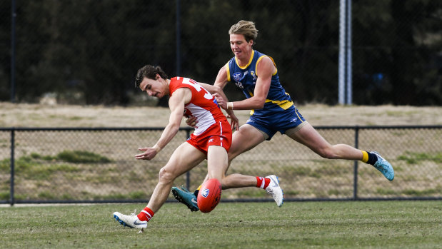 Angus Baker (right).