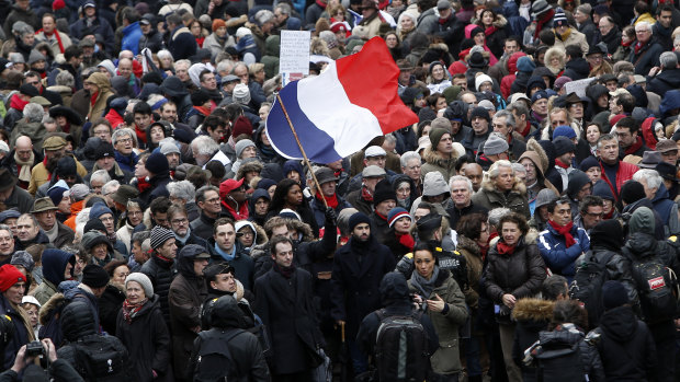 At a rally in Paris on Sunday, hundreds of people wearing red scarves protested against the violence unleashed during two months of anti-government demonstrations by the grassroots yellow vest movement.