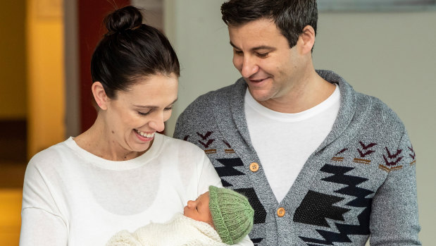 New Zealand Prime Minister Jacinda Ardern and her partner Clarke Gayford with their new baby daughter after the birth.