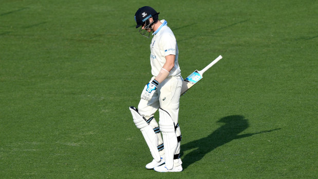 A dejected Steve Smith leaves the field after being dismissed for a five-ball duck.