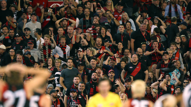 Essendon fans voice their displeasure during the Anzac Day match against Collingwood last year.