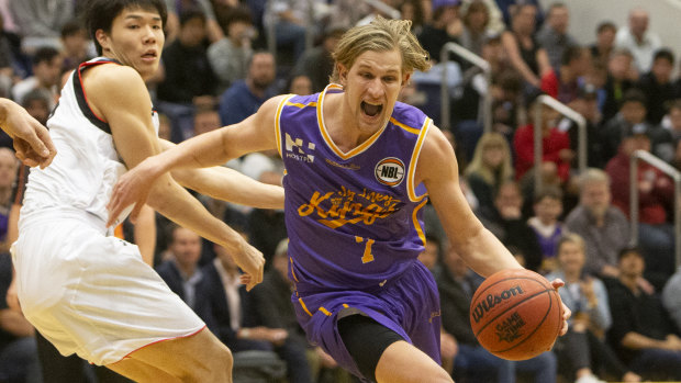 Tom Wilson (right) is making the switch from basketball to Australian rules.