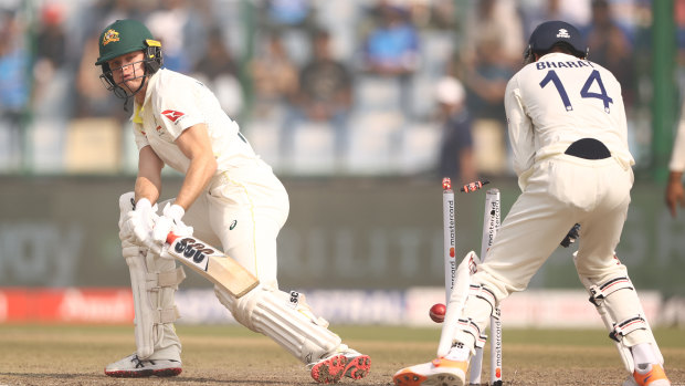 Matt Kuhnemann becomes the last wicket of Australia’s feeble second innings.