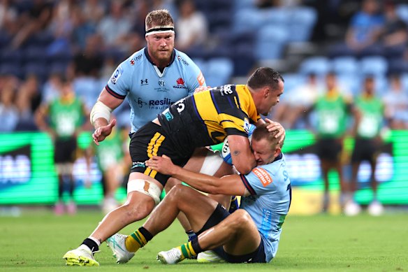 Joey Walton tackles against the Canes.