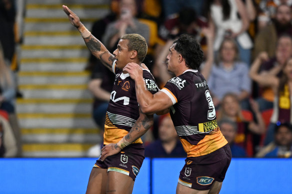 Tristan Sailor celebrates scoring for the Brisbane Broncos.