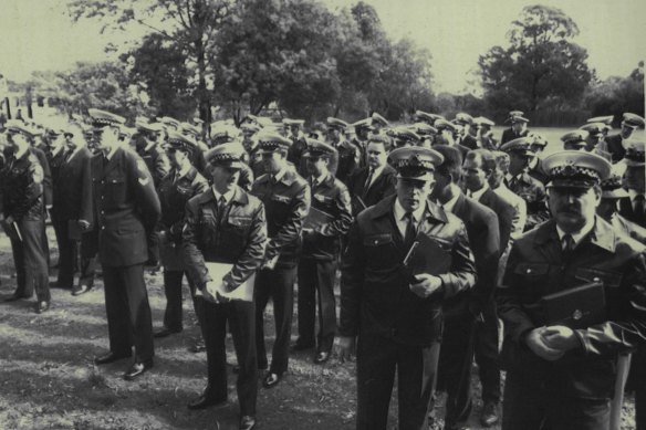 Police mass at Templestowe before dispersing to door knock the area to gain clues into the abduction of Karmein Chan.