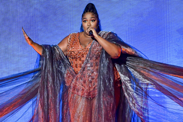 Lizzo performs during the Brit Awards.