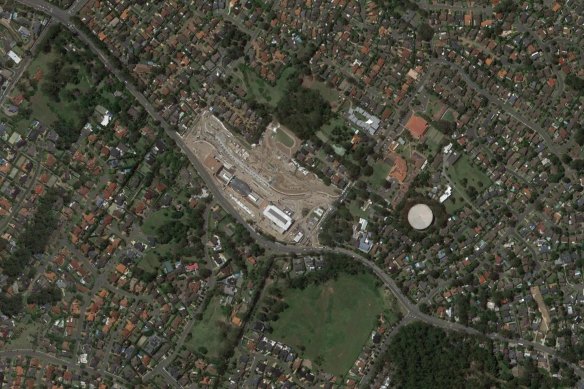 The Cherrybrook metro station, which opened in 2019 but is pictured under construction, is surrounded by low-density detached housing.