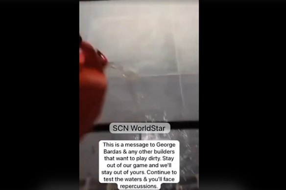 Petrol was poured at the entrance to the Putney home before being set alight.