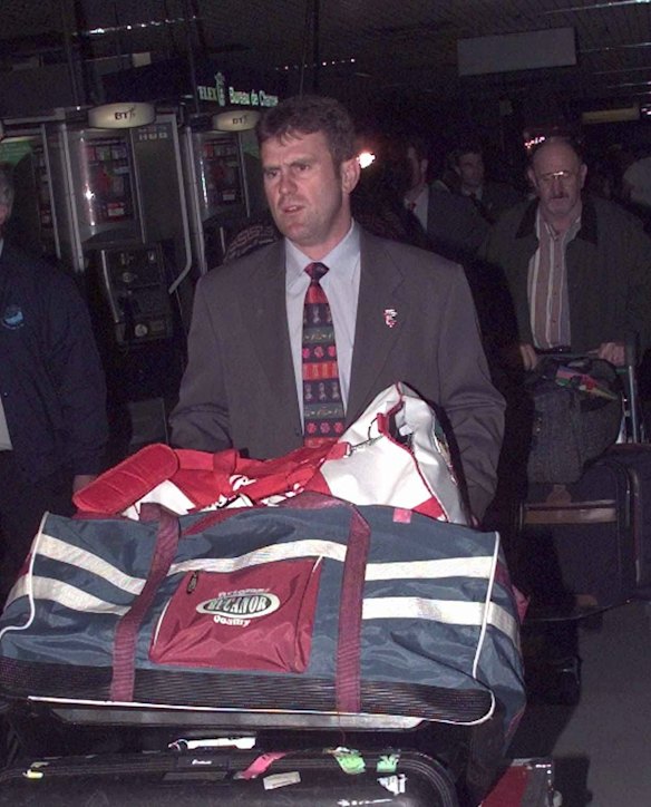Mark Taylor arrives at Heathrow under heavy pressure for the Ashes series.