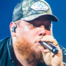 Luke Combs has forced the Brisbane Roar out of Suncorp Stadium.