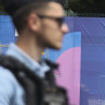 An armed police officer patrols Paris.