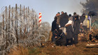 MIgrants are stuck at the border with Belarusian guards pushing them into the EU while their Polish push them back.