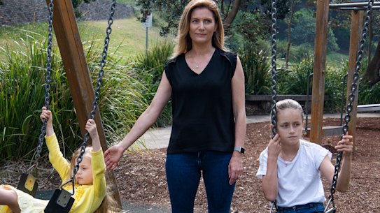 Shannon Ruddock with her daughters Abby and Maddie at the playground at  Bronte Beach. Her late father loved the water.  Ms Ruddock gave evidence to the Royal Commission that insufficient staff meant her father;s pain from cancer went unchecked, and he suffered unnecessarily. 
