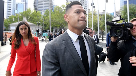 Israel Folau arrives at Melbourne's Federal Circuit Court with his wife Maria.