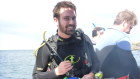 Elliot Dellys, founder of Phronesis Security, kitted up and ready for a dive.