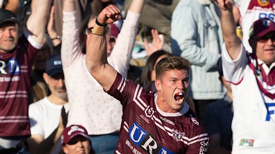 Rueben Garrick celebrates a try for the home side.