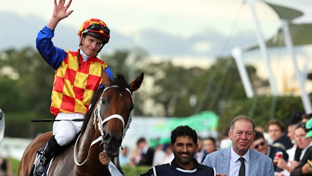 James McDonald salutes the crowd after winning the Rosehill Guineas on Autumn Boy.