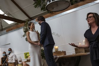 Bride Siobhan Hyland and groom Dean Casey re-arranged their wedding in hours on Friday after having each of their three attempts to schedule the big day were disrupted by Melbourne’s lockdowns. They tied the knot about 7pm.