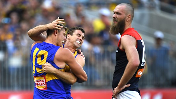 Max Gawn can only watch on as Jamie Cripps kicks another goal for the Eagles.