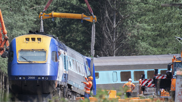 A sling on a crane is used to move part of the XPT train in Wallan on Sunday.