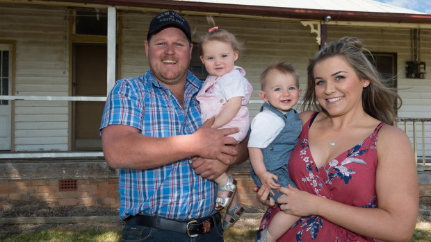 Toad and Mandy with their twins Layla and Lenny at home in the Bega Valley Shire.