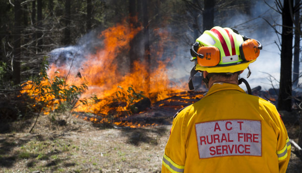 ACT rural firefighters at the fire containment line at Pierces Creek.