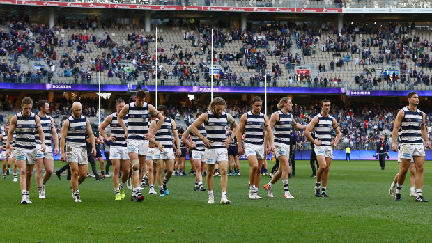 Diminshed: Geelong players leave the field after losing to Fremantle on Saturday.