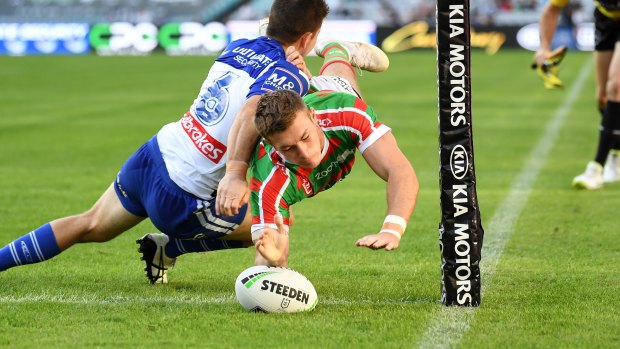 Starting early: Souths winger Campbell Graham crashes over in the opening minutes.
