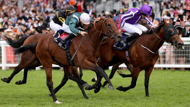 Determined finish: Merchant Navy, right, ridden by Ryan Moore wins the Diamond Jubilee Stakes at Royal Ascot.