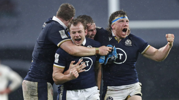 Scotland’s Hamish Watson, right, and teammates celebrate beating England at Twickenham earlier this year. 