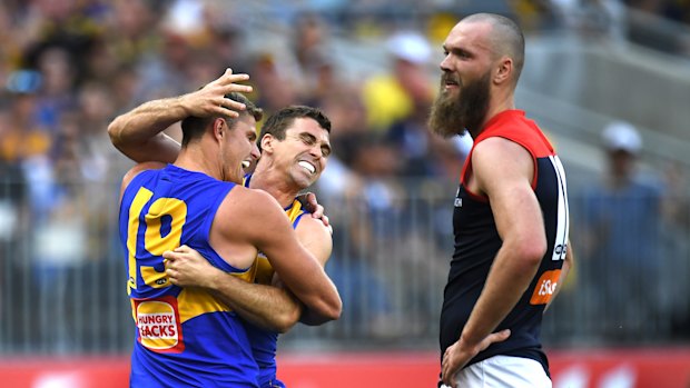 Max Gawn can only watch on as Jamie Cripps kicks another goal for the Eagles.