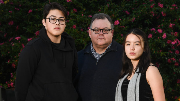 Scott Minehane with his children Caleb and Tara.