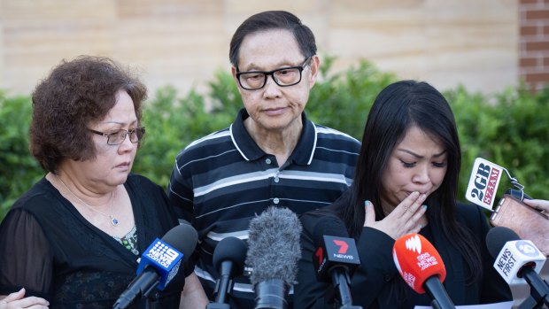 Quanne Diec's mother Ann (left), father Sam and cousin Christine Woo outside Granville police station.