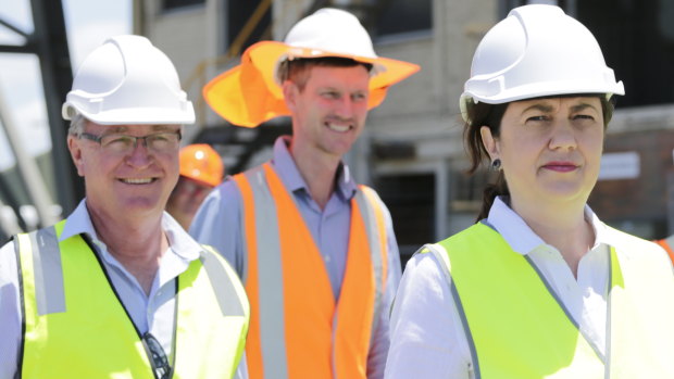 Les Walker (left) with Transport Minister Mark Bailey (centre) and Premier Annastacia Palaszczuk (right) during the 2020 election campaign.