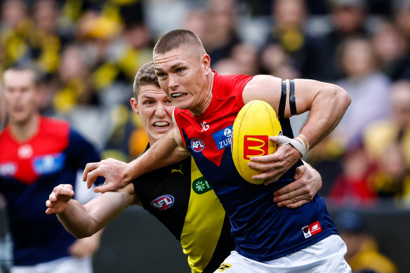 Melbourne’s Adam Tomlinson was subbed out against Richmond.