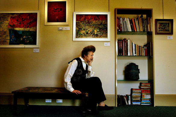 Art collector Elinor Wrobel sits amongst the work of Australian abstract artist John Passmore. 