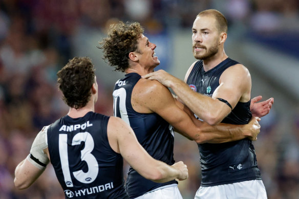 Harry McKay and Charlie Curnow celebrate at the Gabba.