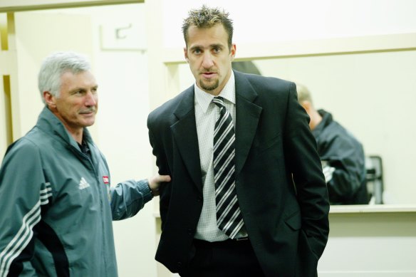 Collingwood coach Michael Malthouse and Anthony Rocca before the 2003 grand final.
