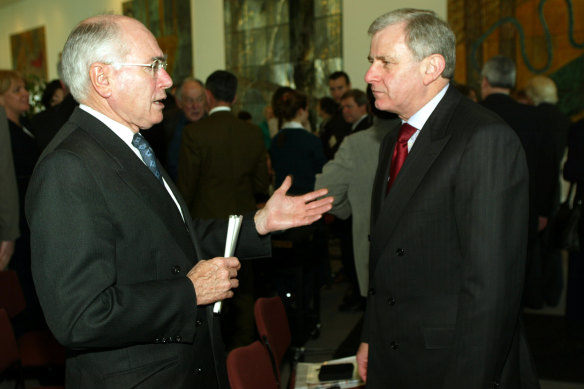 John Howard and Simon Crean, pictured as prime minister and opposition leader in 2003. Crean opposed Howard’s position on Iraq. 