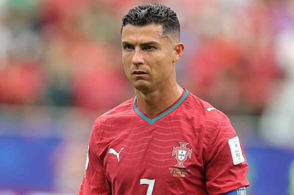 Cristiano Ronaldo walks off the pitch after the 1-1 draw against the Democratic Republic of the Congo.