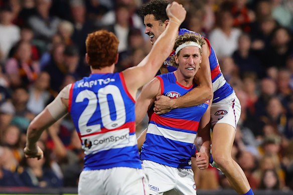 Aaron Naughton celebrates a goal.