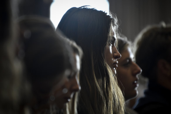 Lead plaintiff Rikki Held listens to testimony during a hearing in the climate change lawsuit, Held v Montana, at the Lewis and Clark County Courthouse in Helena, Montana.