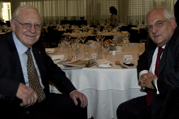 Max Walsh (left) with economics journalist Martin Wolf in 2012.