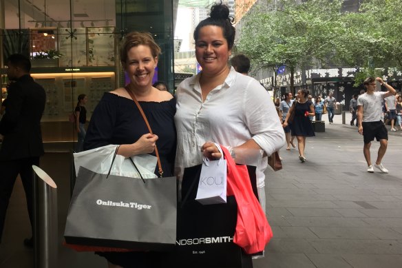 Sarah Drysdale and Tina Tupou shopping at Pitt Street Mall on Christmas Eve.