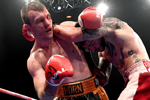 Jeff Horn and Michael Zerafa trade blows during their rematch in Brisbane.